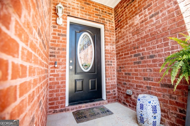 207 Meadow Lake Dr, Carrollton, GA 30116 - property entrance featuring brick siding