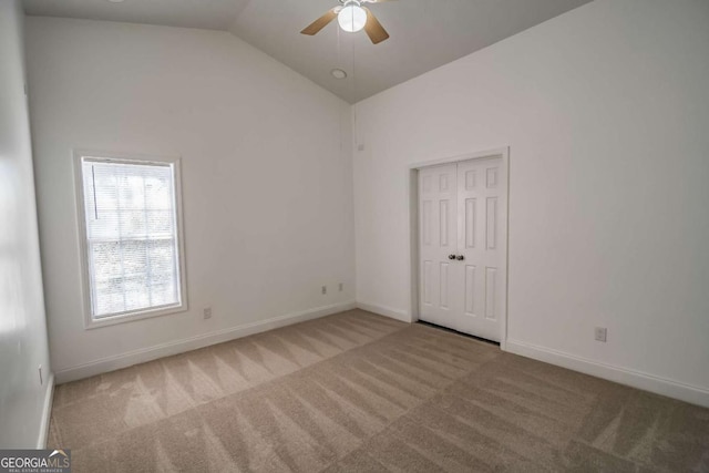107 Griffith St, Winder, GA 30680 - unfurnished room featuring baseboards, ceiling fan, carpet, and lofted ceiling