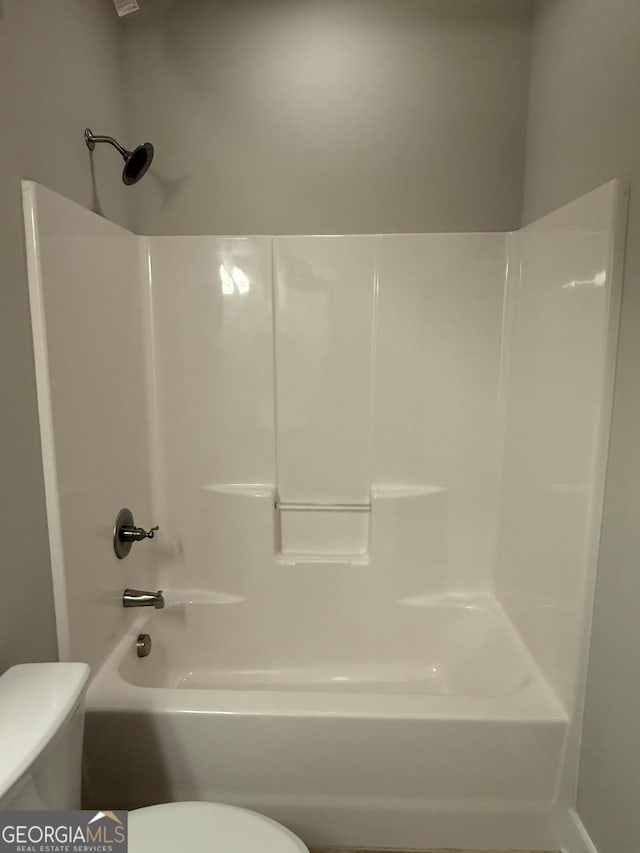 2470 Wevok Way, Grayson, GA 30017 - bathroom featuring toilet and shower / tub combination