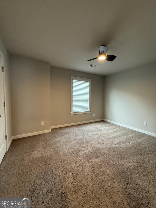 2470 Wevok Way, Grayson, GA 30017 - carpeted empty room featuring baseboards, ceiling fan, and visible vents