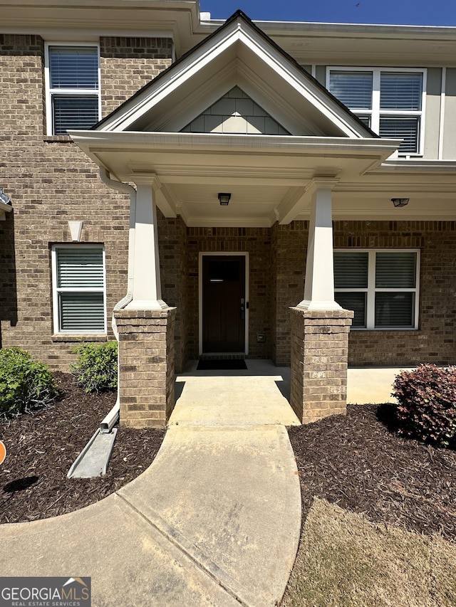 2470 Wevok Way, Grayson, GA 30017 - view of exterior entry with brick siding and covered porch