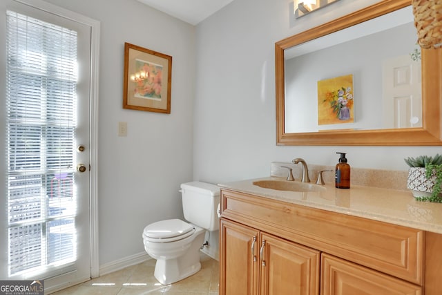 1135 Parkview Way, Lilburn, GA 30047 - bathroom with vanity, toilet, tile patterned flooring, and baseboards