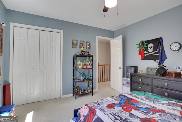 1135 Parkview Way, Lilburn, GA 30047 - carpeted bedroom featuring baseboards, ceiling fan, and a closet