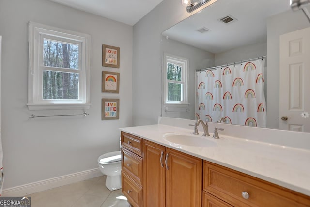 1135 Parkview Way, Lilburn, GA 30047 - full bathroom featuring tile patterned floors, toilet, vanity, baseboards, and visible vents
