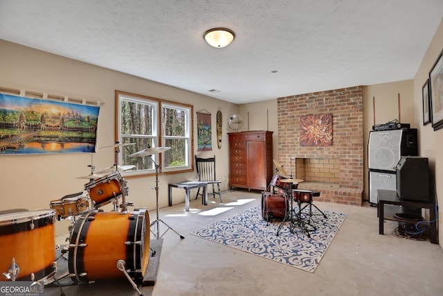 1135 Parkview Way, Lilburn, GA 30047 - living area with concrete floors, a textured ceiling, and visible vents