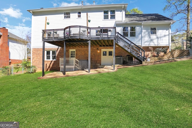 1135 Parkview Way, Lilburn, GA 30047 - back of house with stairway, a yard, brick siding, and a wooden deck