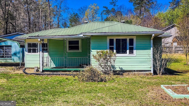 438 Wilkerson Rd SW, Rome, GA 30165 - view of front of house featuring a front lawn, metal roof, and crawl space