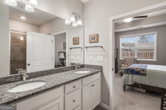 2910 Bishopstone Way, Cumming, GA 30040 - full bath featuring double vanity, a sink, a ceiling fan, and visible vents