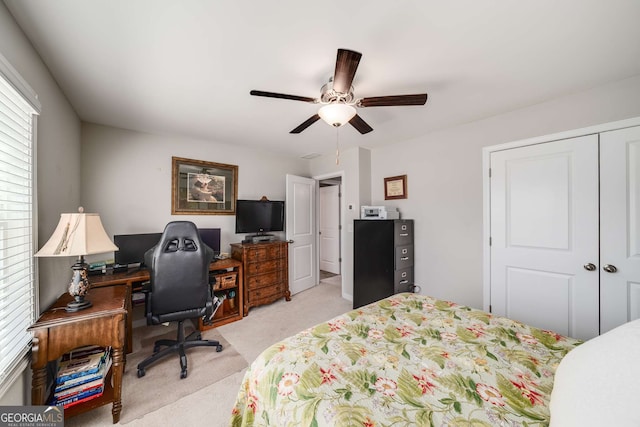 2910 Bishopstone Way, Cumming, GA 30040 - bedroom featuring a closet, ceiling fan, and light carpet