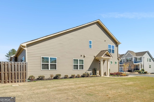 2910 Bishopstone Way, Cumming, GA 30040 - back of house with fence and a lawn