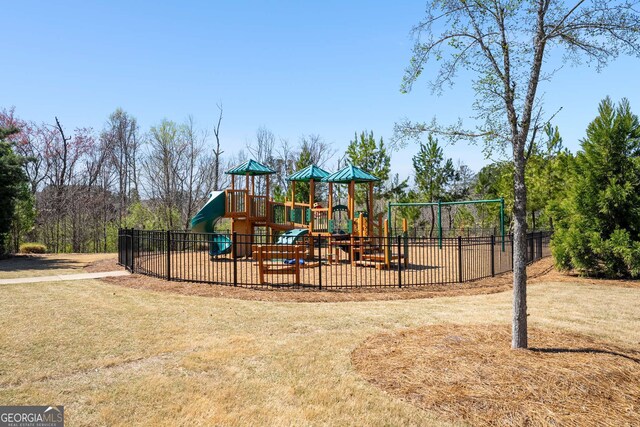2910 Bishopstone Way, Cumming, GA 30040 - community play area with fence and a lawn
