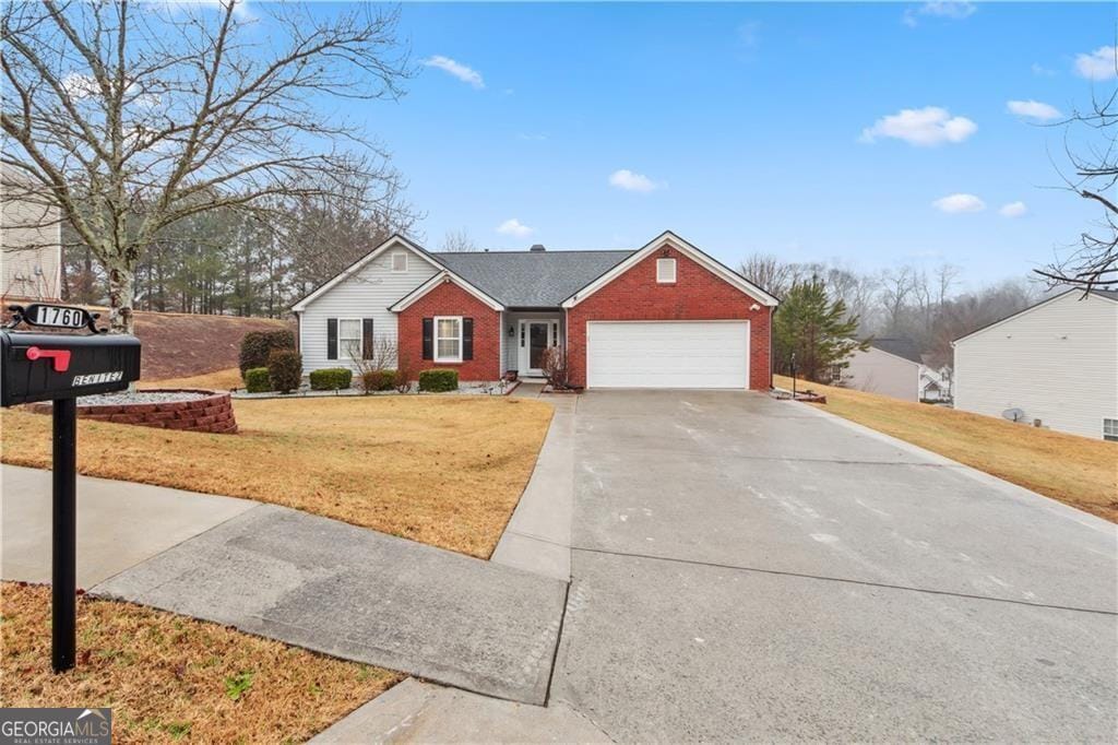 1760 Campbell Ives Dr, Lawrenceville, GA 30045 - single story home with brick siding, a front lawn, driveway, and a garage