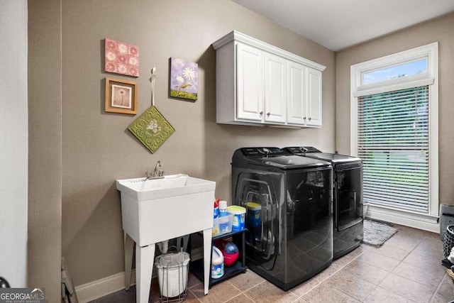 1521 Waterside Ct, Jefferson, GA 30549 - laundry area with separate washer and dryer, cabinet space, and baseboards