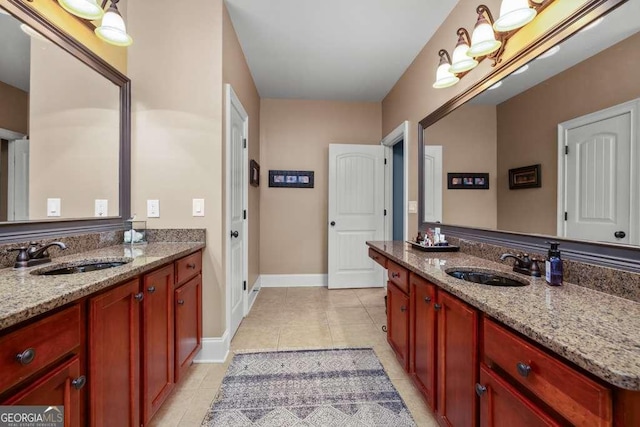 1521 Waterside Ct, Jefferson, GA 30549 - full bath featuring tile patterned floors, two vanities, and baseboards