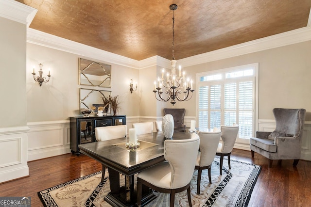 150 Inwood Ter, Roswell, GA 30075 - dining space with a decorative wall, wainscoting, hardwood / wood-style flooring, and an inviting chandelier