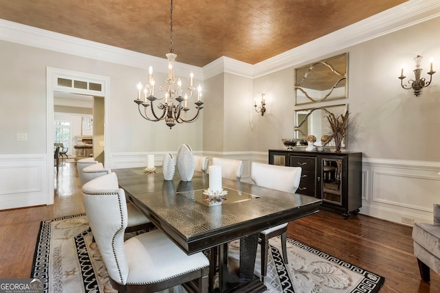 150 Inwood Ter, Roswell, GA 30075 - dining space featuring a chandelier, dark wood finished floors, and a wainscoted wall