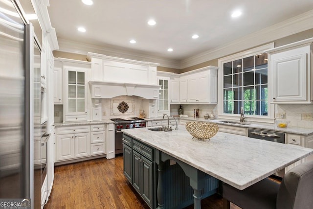 150 Inwood Ter, Roswell, GA 30075 - kitchen featuring a sink, ornamental molding, high end appliances, and white cabinetry