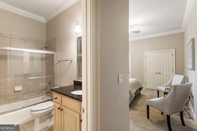 150 Inwood Ter, Roswell, GA 30075 - full bathroom with toilet, vanity, ornamental molding, and bath / shower combo with glass door