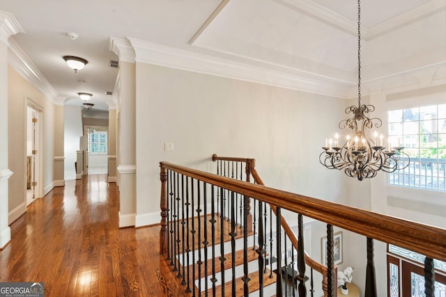 150 Inwood Ter, Roswell, GA 30075 - hall with a notable chandelier, baseboards, an upstairs landing, crown molding, and dark wood-type flooring