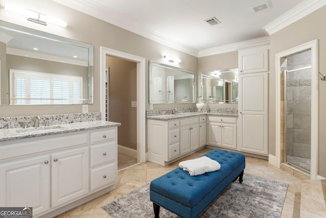 150 Inwood Ter, Roswell, GA 30075 - bathroom featuring a shower stall, visible vents, a sink, and ornamental molding