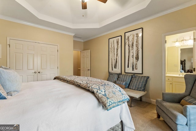 150 Inwood Ter, Roswell, GA 30075 - carpeted bedroom featuring a closet, ornamental molding, a ceiling fan, connected bathroom, and a raised ceiling