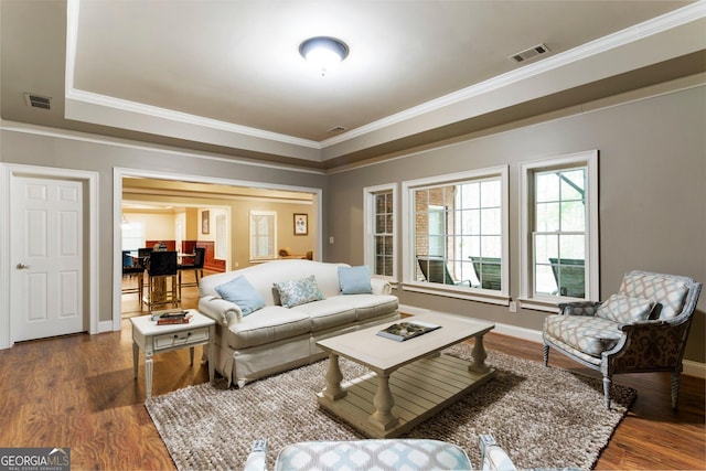150 Inwood Ter, Roswell, GA 30075 - living area with crown molding, visible vents, baseboards, and wood finished floors