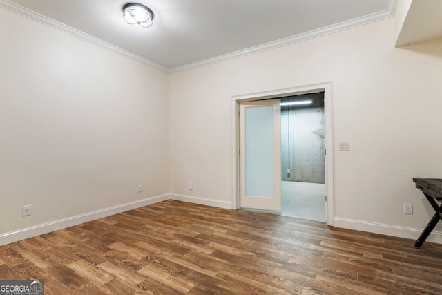 150 Inwood Ter, Roswell, GA 30075 - unfurnished room featuring crown molding, baseboards, and wood finished floors