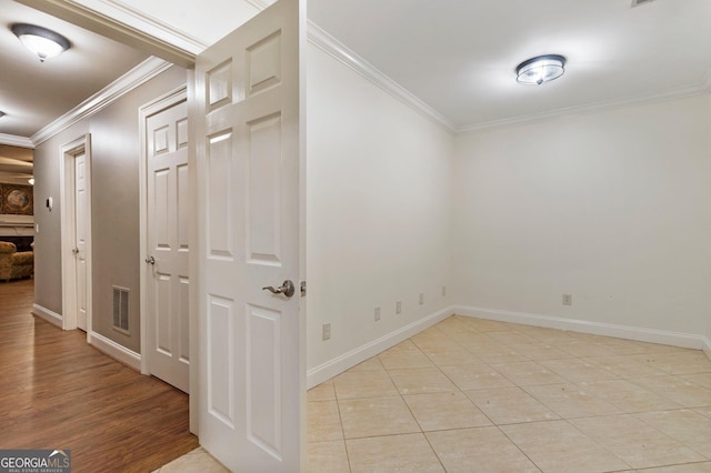 150 Inwood Ter, Roswell, GA 30075 - hall featuring ornamental molding, visible vents, baseboards, and light tile patterned floors