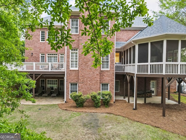 150 Inwood Ter, Roswell, GA 30075 - rear view of house featuring a patio and brick siding