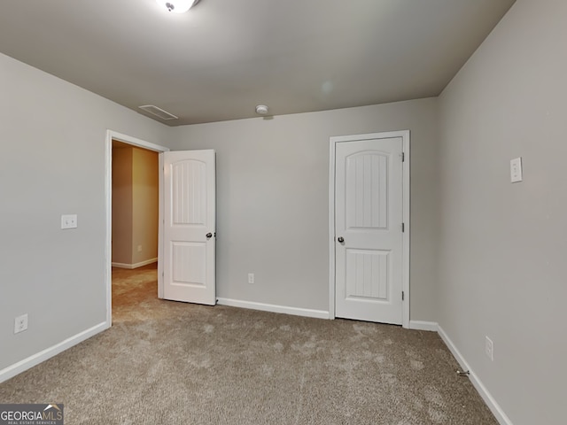 3713 Upland Dr, Mcdonough, GA 30253 - unfurnished bedroom with carpet floors and baseboards