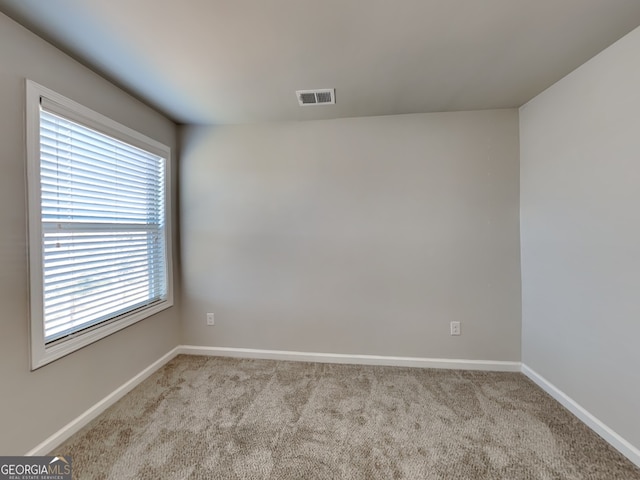 3713 Upland Dr, Mcdonough, GA 30253 - carpeted spare room featuring baseboards and visible vents