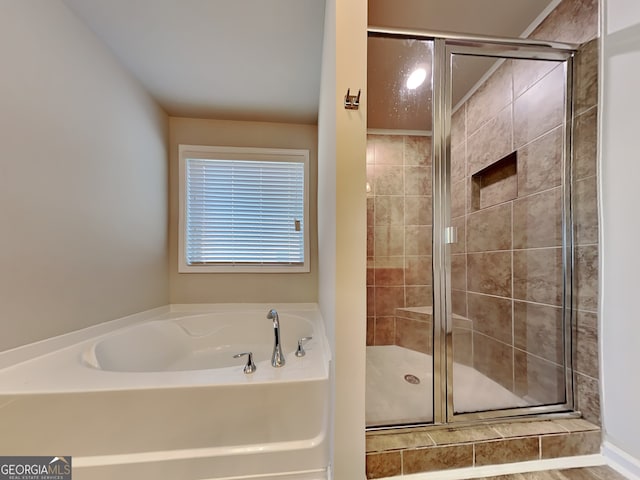 3713 Upland Dr, Mcdonough, GA 30253 - bathroom featuring a bath and a stall shower