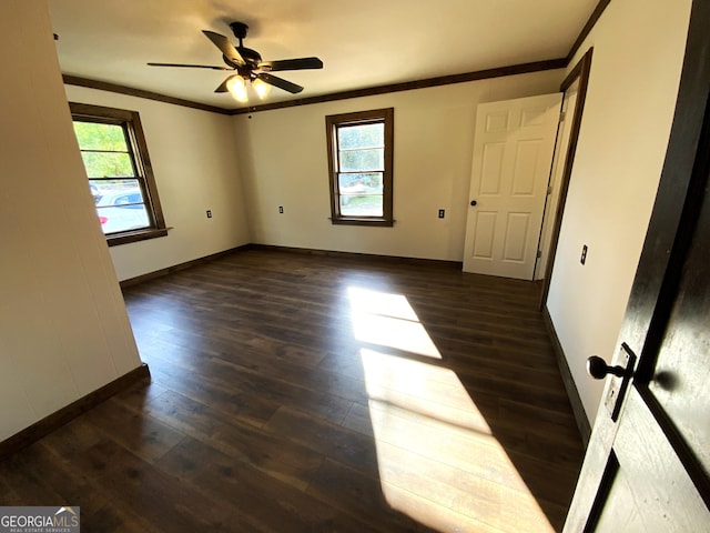 2790 Old Farmington Rd, Watkinsville, GA 30677 - spare room featuring dark wood-style floors, crown molding, and ceiling fan