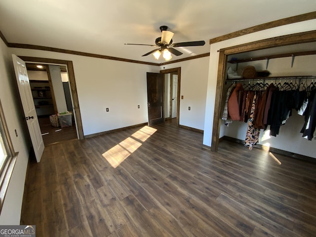 2790 Old Farmington Rd, Watkinsville, GA 30677 - unfurnished bedroom featuring dark wood-type flooring, ornamental molding, a closet, and ceiling fan