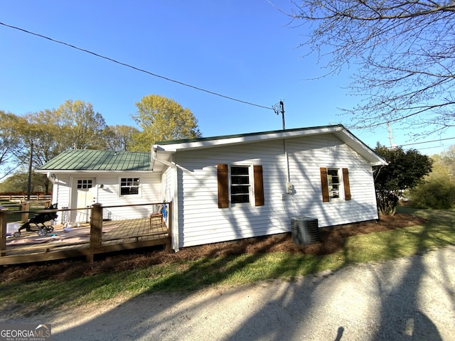 2790 Old Farmington Rd, Watkinsville, GA 30677 - view of home's exterior featuring a deck and a metal roof