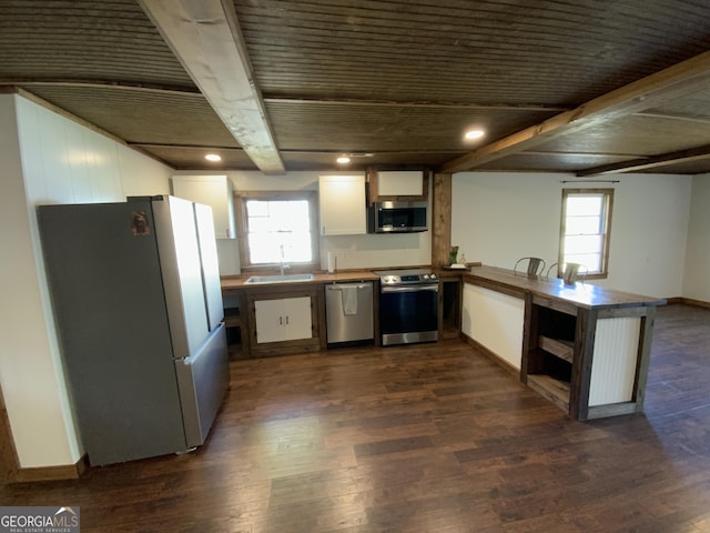 2790 Old Farmington Rd, Watkinsville, GA 30677 - kitchen with stainless steel appliances, a peninsula, plenty of natural light, white cabinetry, and recessed lighting