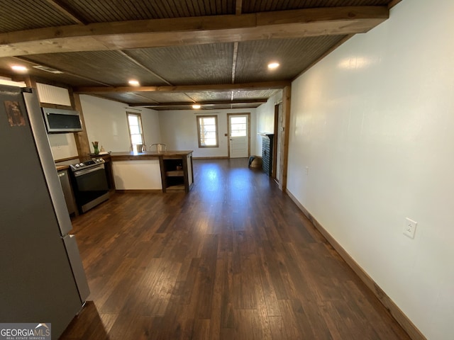2790 Old Farmington Rd, Watkinsville, GA 30677 - kitchen featuring appliances with stainless steel finishes, a peninsula, dark wood finished floors, open floor plan, and recessed lighting