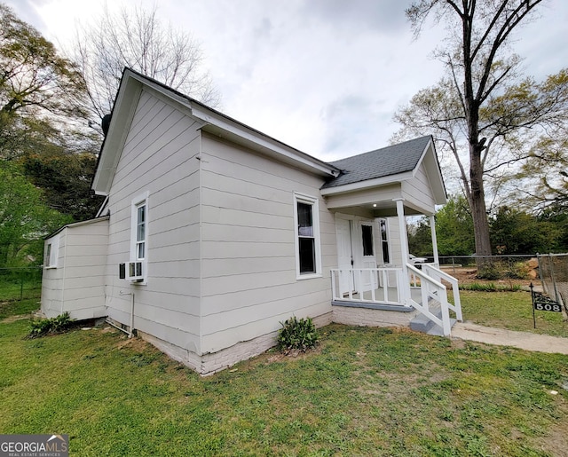 508 Granite St, Hogansville, GA 30230 - exterior space featuring a front yard, a shingled roof, and fence