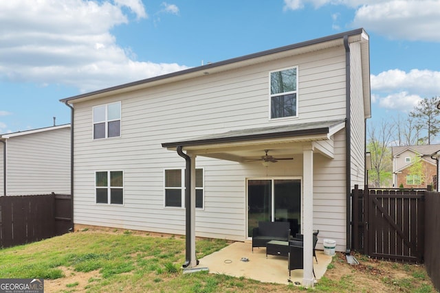 137 Park Chase Ln, Dallas, GA 30132 - back of property with a gate, a patio, ceiling fan, a fenced backyard, and outdoor lounge area