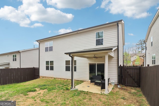 137 Park Chase Ln, Dallas, GA 30132 - rear view of house featuring a fenced backyard, a yard, ceiling fan, and a patio