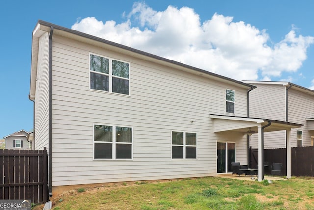 137 Park Chase Ln, Dallas, GA 30132 - back of property featuring a yard, fence, and a patio
