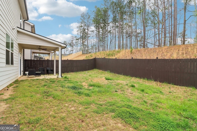 137 Park Chase Ln, Dallas, GA 30132 - view of yard featuring a patio, ceiling fan, and a fenced backyard
