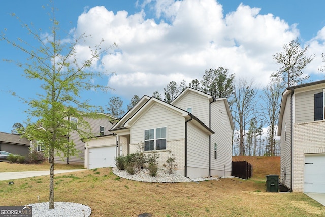 137 Park Chase Ln, Dallas, GA 30132 - view of front facade featuring brick siding, concrete driveway, and a front yard