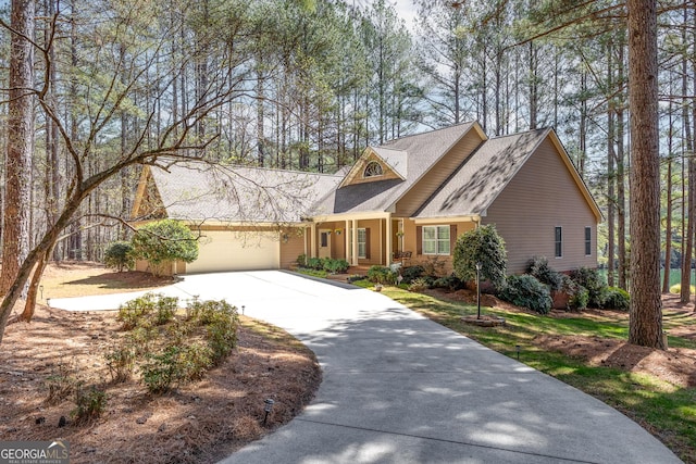 404 Golden Delicious Rd, Clarkesville, GA 30523 - view of front of property featuring an attached garage, roof with shingles, and concrete driveway