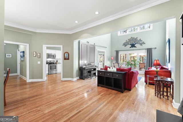 404 Golden Delicious Rd, Clarkesville, GA 30523 - living area featuring a high ceiling, light wood-style flooring, baseboards, ornamental molding, and recessed lighting