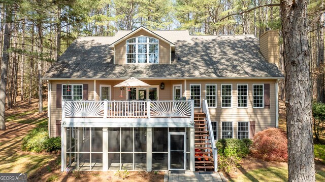 404 Golden Delicious Rd, Clarkesville, GA 30523 - rear view of house featuring stairway, a wooden deck, a shingled roof, and a sunroom