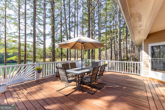 404 Golden Delicious Rd, Clarkesville, GA 30523 - wooden deck featuring outdoor dining area