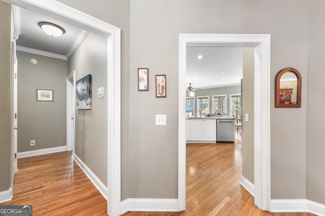404 Golden Delicious Rd, Clarkesville, GA 30523 - hallway with light wood-type flooring, baseboards, and ornamental molding