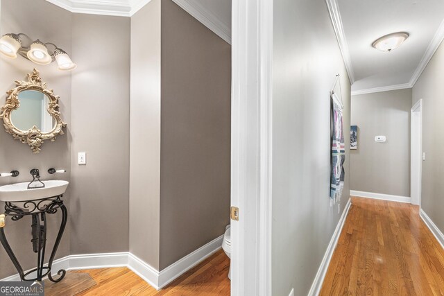 404 Golden Delicious Rd, Clarkesville, GA 30523 - corridor featuring baseboards, wood finished floors, and crown molding