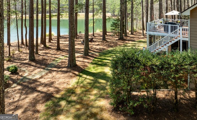 404 Golden Delicious Rd, Clarkesville, GA 30523 - view of yard featuring stairway and a deck with water view